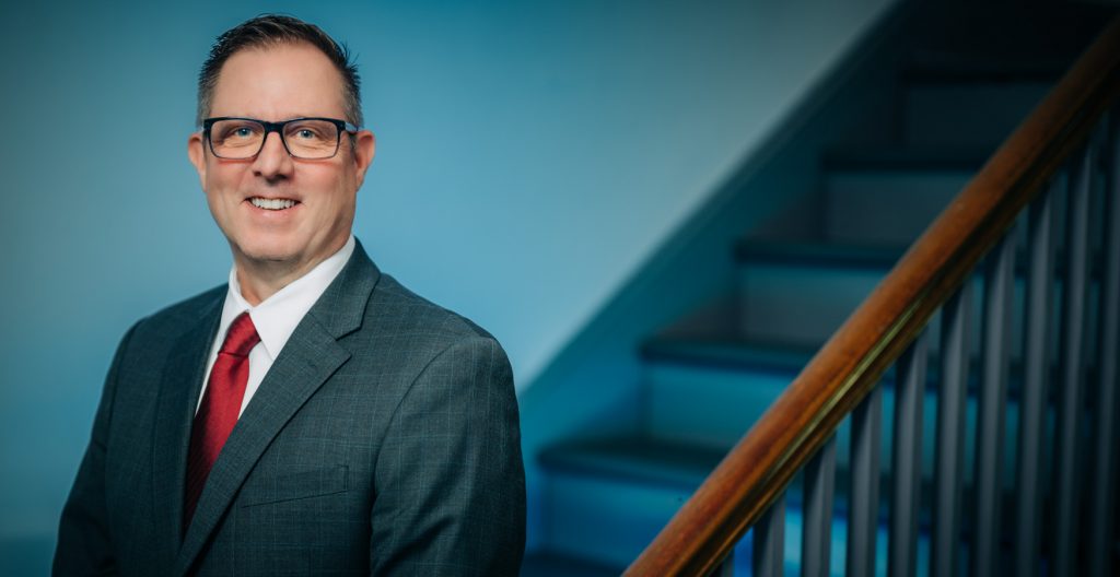 Professional headshot of The Office of Inspector General's Investigative Supervisor, James P. Greene.